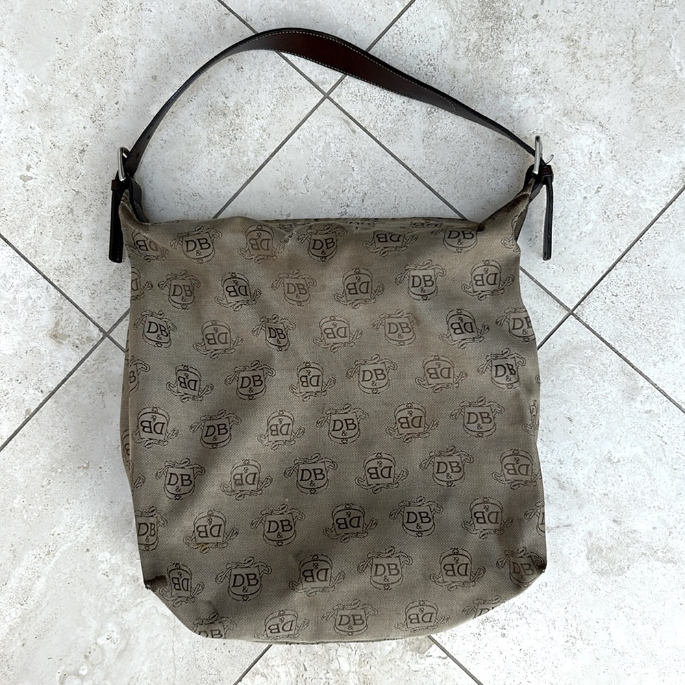 Dooney & Bourke DB brown shield signature hobo purse.